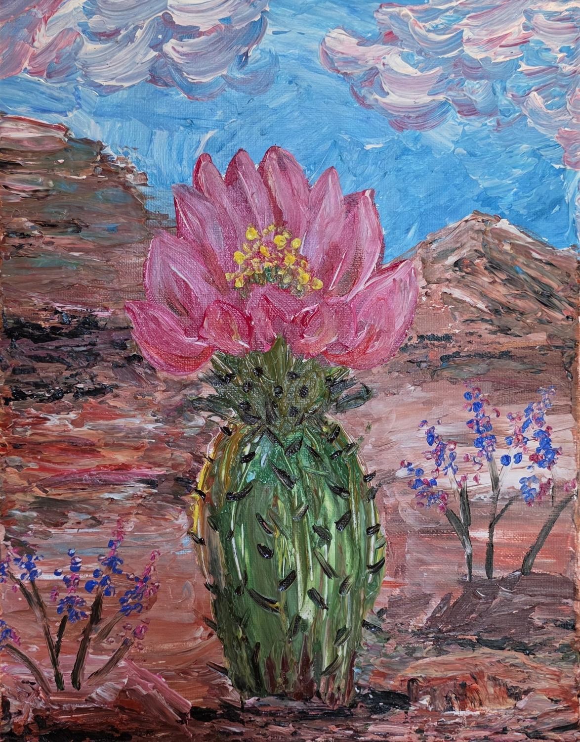 Impasto acrylic of a green cactus with a large pink bloom and yellow stamens, desert hills and blue wildflowers under a blue sky