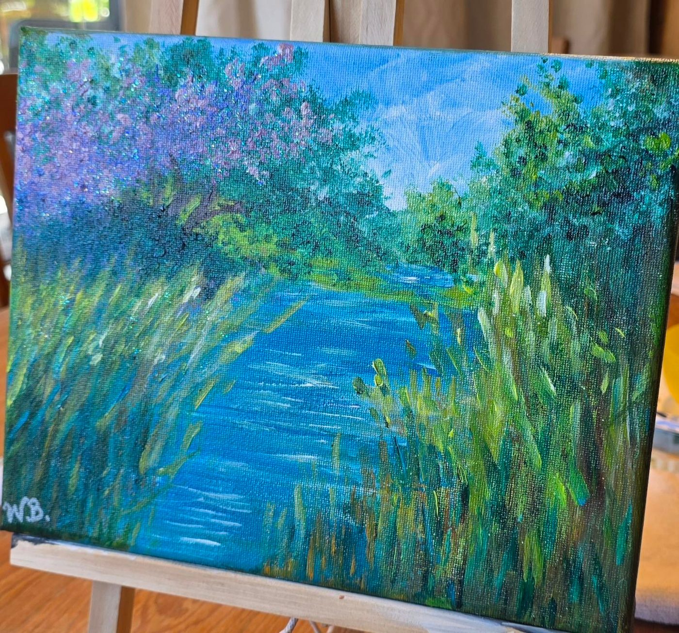 Summer Creek on a studio easel, original acrylic on canvas