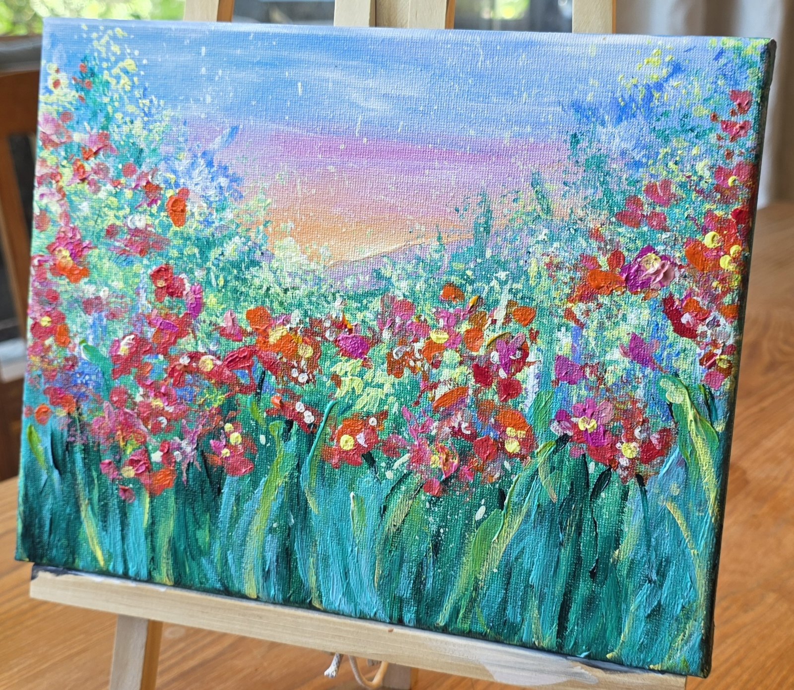 Sunrise in Poppy on a studio easel